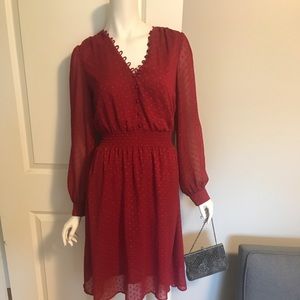 Beautiful red dress with sheer sleeves